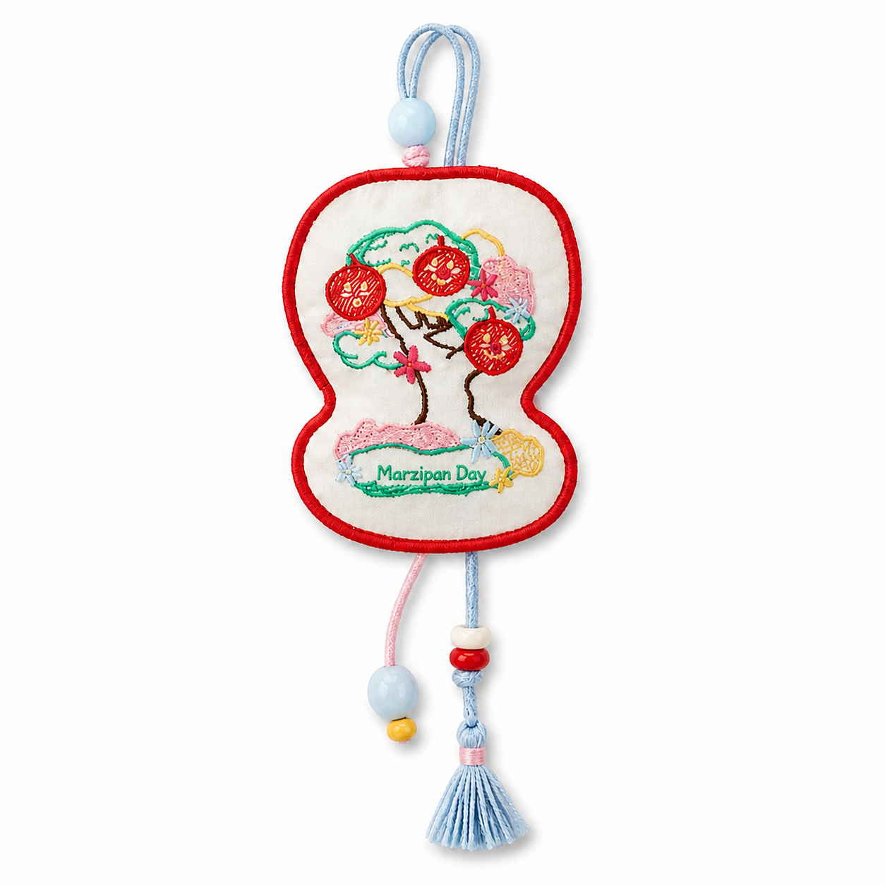 Apple Stitch Car Fragrance Charm — Marzipan Day product image on white background